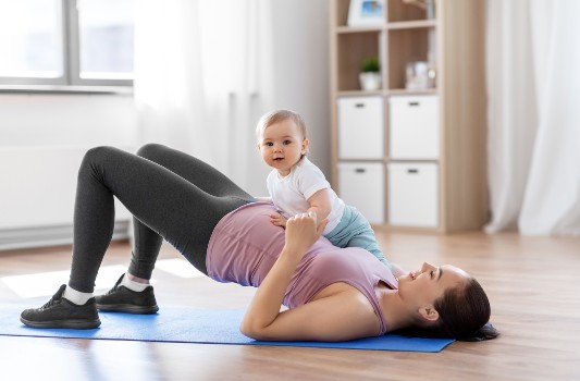 mother and baby during a physiotherapy session at Centre Philae